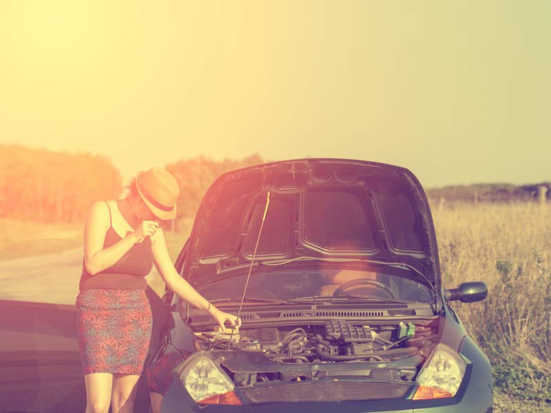 The women checking the car for repair at Peoria, AZ