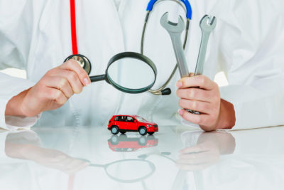 magnifying glass over car