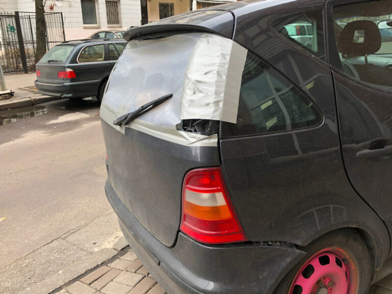 Temporarily cover a broken car window Auto Glass Express Windshield