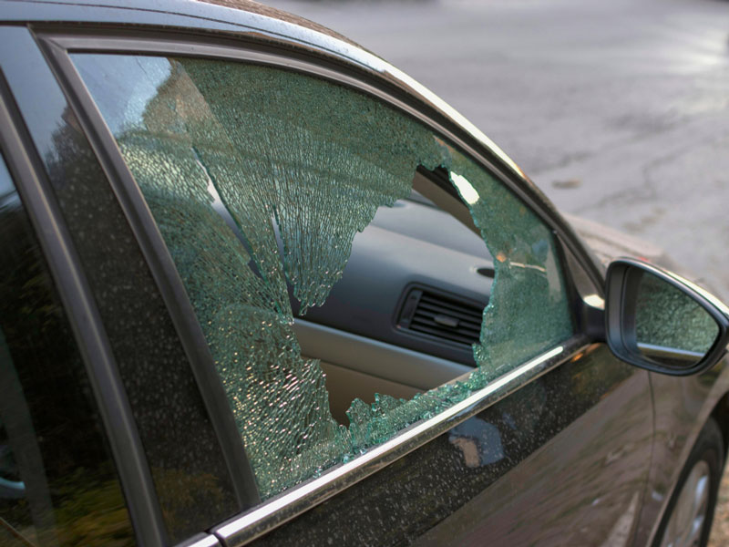 car with broken side door glass